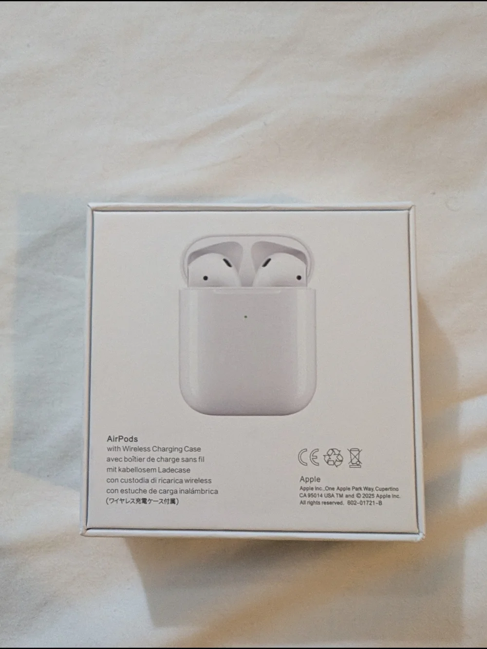 Apple AirPods with Charging Case - White